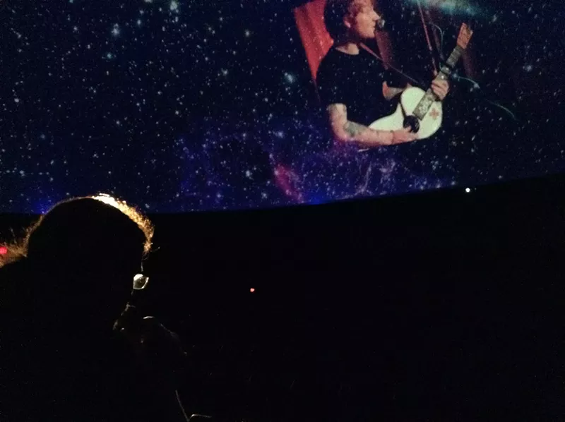 Image: Feeling the laser karaoke love.