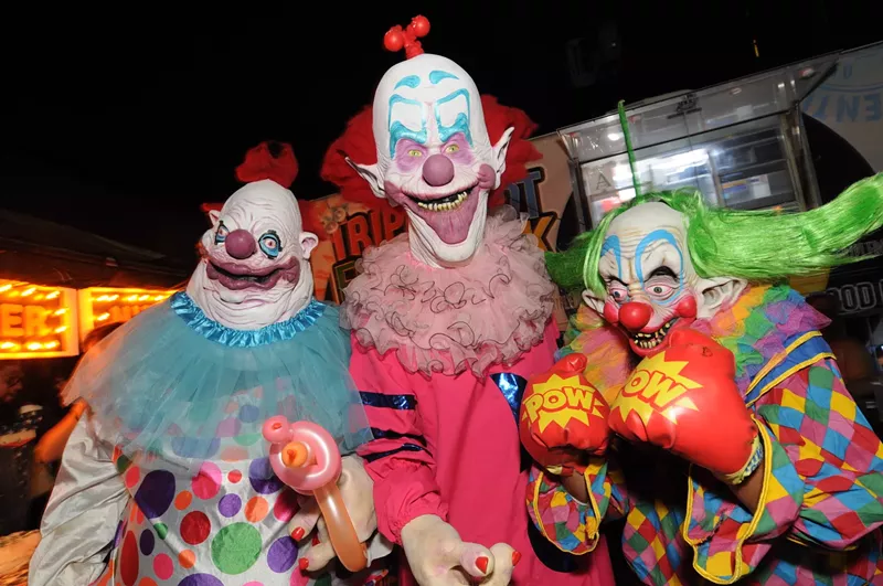 Image: Three partygoers dressed to impress at last year’s Punk Rock Halloween Bash and Monster Midway.