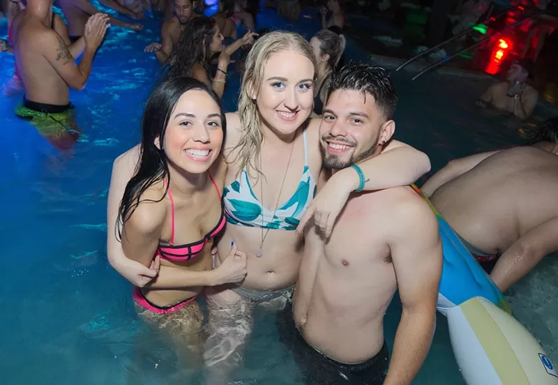 Image: Enjoying pool party fun after dark at Maya in Scottsdale.