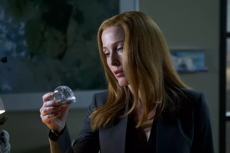 Image: In The X-Files, Gillian Anderson plays Dana Scully, a character created in the '90s who not only was a medical doctor and FBI agent with a degree in physics and a badge from Quantico, but also a brave, badass nerd.
