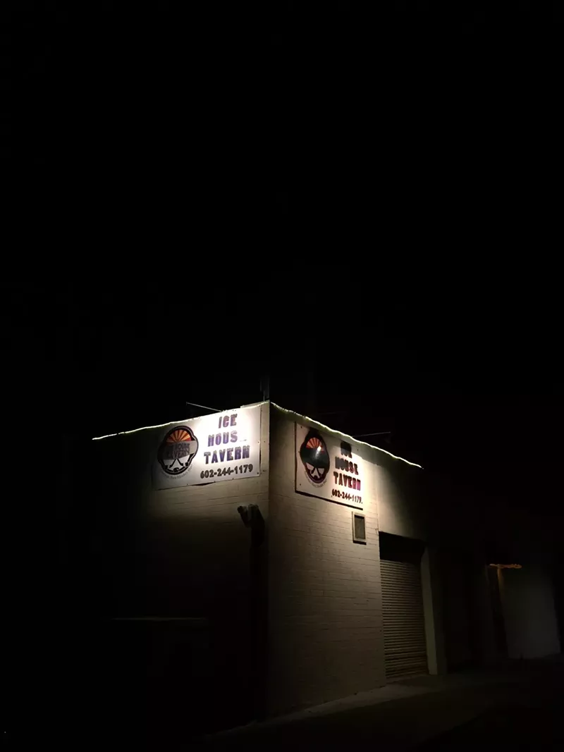 Image: One side of the Ice House sign has taken a beating from the sun.
