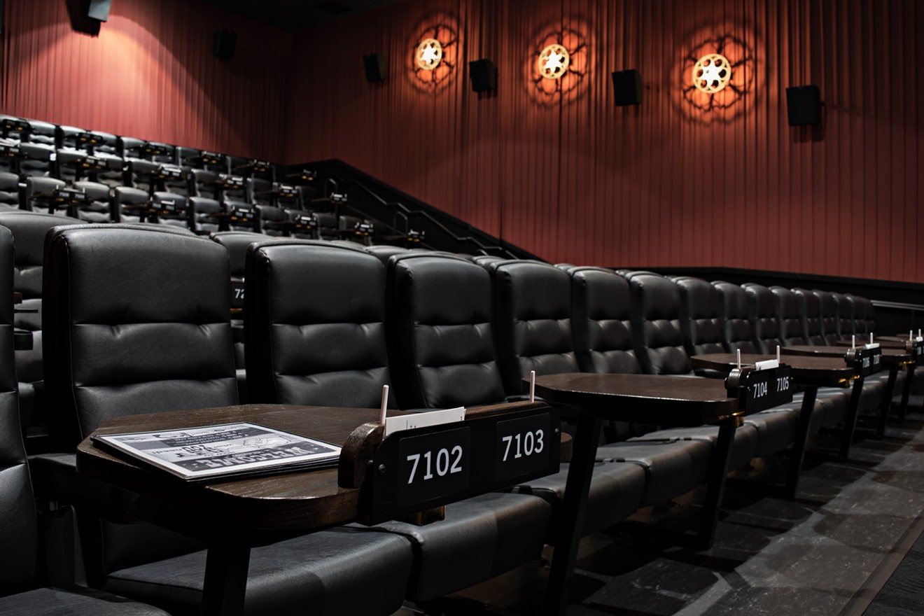 Alamo Drafthouse in Chandler has tables for guests to eat on, but they're rather small.