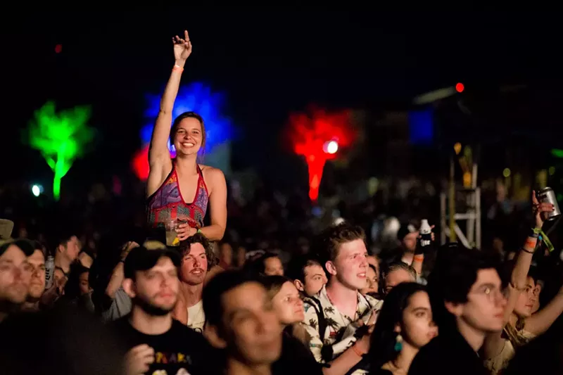 Image: This fan knows the best way to get a better view for Local Natives at McDowell Mountain Music Festival.