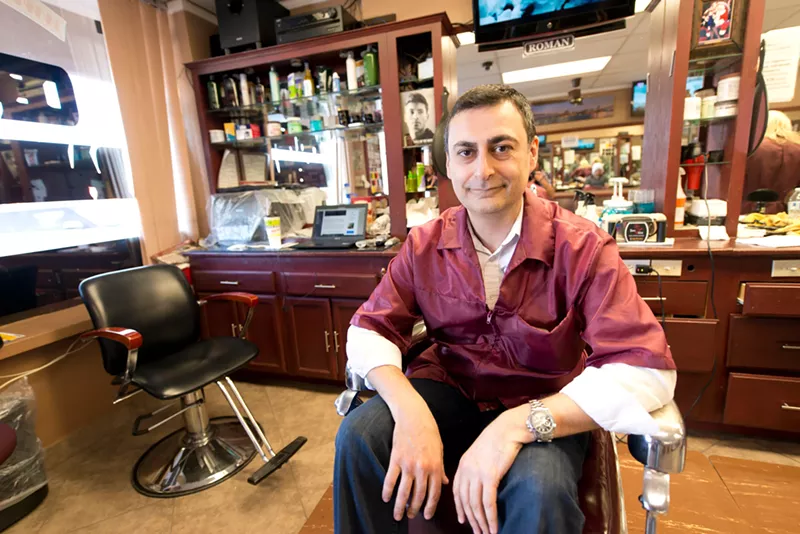 Image: Roman Nektalov owns Central Barbershop.