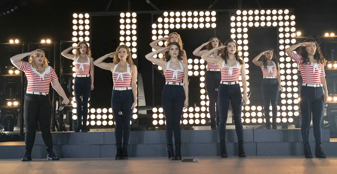 The cast of Pitch Perfect 3 includes Rebel Wilson (left), Anna Kendrick (middle, front), and Anna Camp (middle, back) as the Bellas, the collegiate a cappella troupe from the first two films that joins a USO tour.