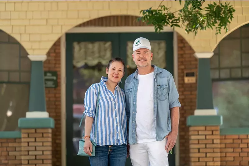 Image: Glai Baan owners Cat Bunnag and Dan Robinson stand in front of the historic Moeur House in downtown Tempe, where they will debut a new concept in 2026.