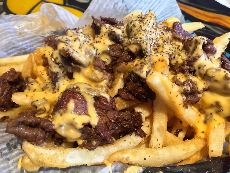 Image: The Philly Fries at Spinelli's Pizzeria has Cheese Whiz and can be delivered to you till 5 a.m.