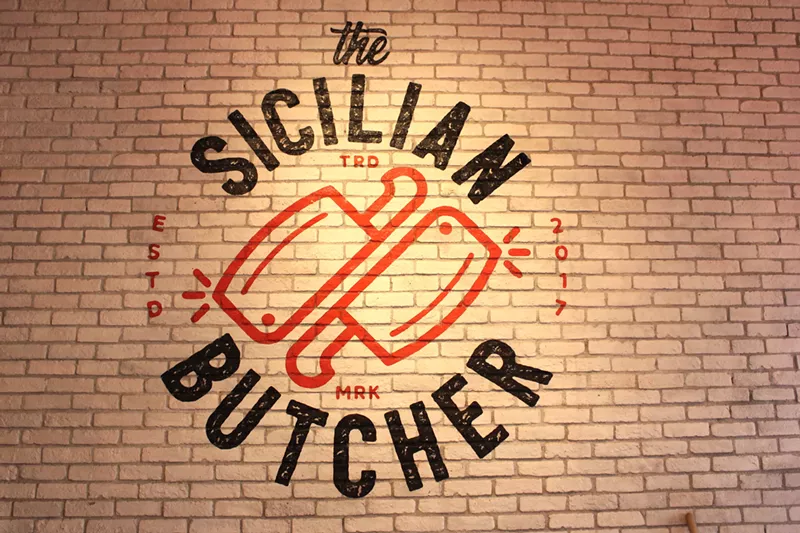 Image: The paintings and murals on the walls of The Sicilian Butcher are handmade.