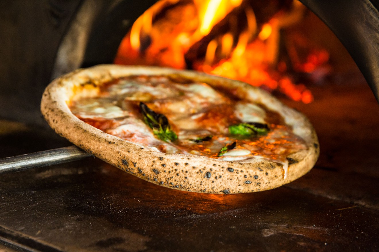 Pomo's pizzas are fired for 60 to 90 seconds in a 905-degree oven.