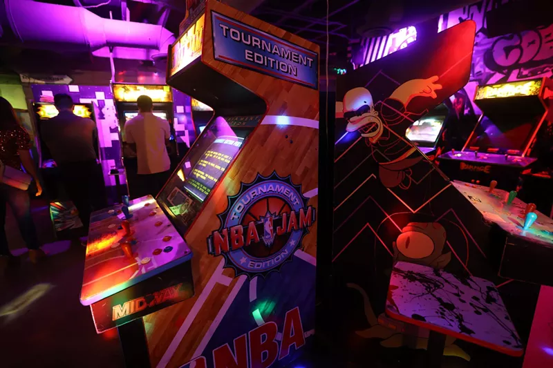 Image: Old-school arcade game cabinets.