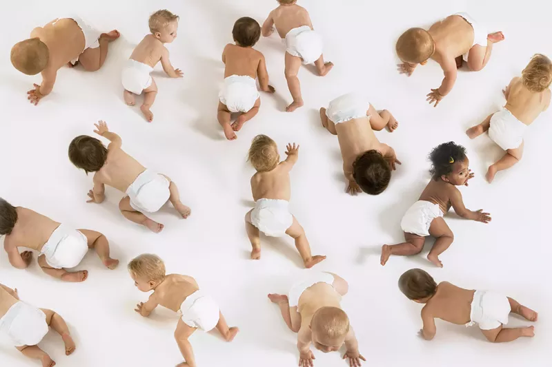 Image: a bunch of babies crawling in diapers