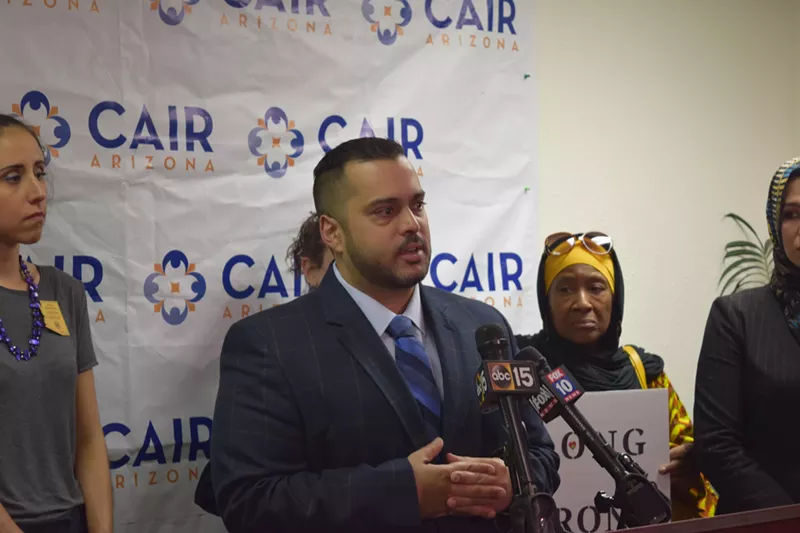 Image: Imraan Siddiqi, the director of the Arizona chapter of the Council on American-Islamic relations, addresses the Supreme Court decision on the travel ban at the organization's office.