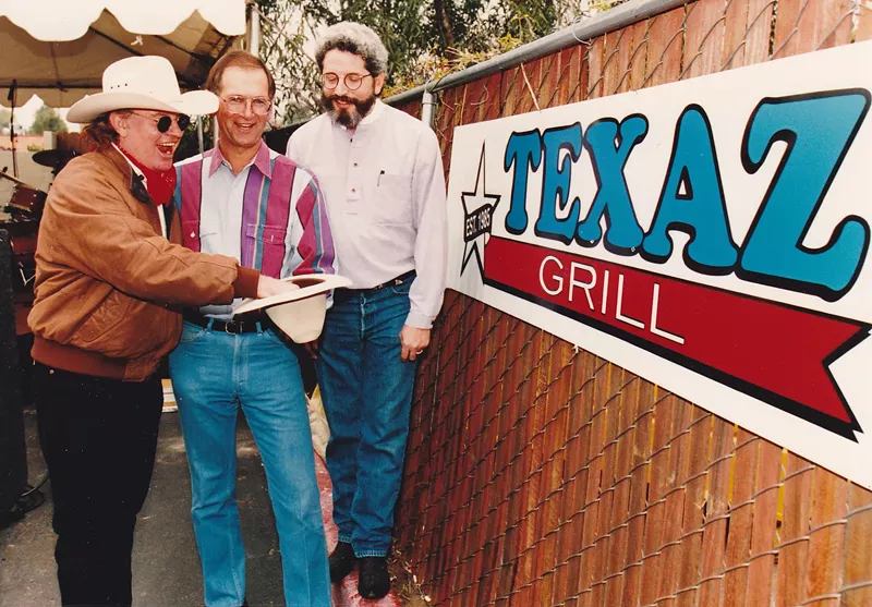 Image: Jim Mitchell, Steve Freidkin and Gary P. Nunn at the restaurant's renaming party. Nunn plucked the winning name from a hat.