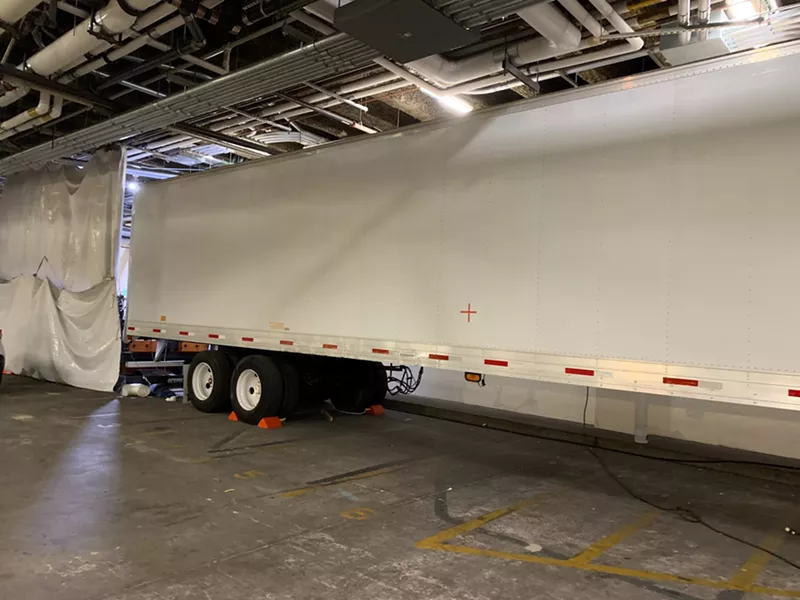 Image: Arizona's largest hospital system is using a refrigerated trailer to store bodies after one of its Phoenix morgues filled up.