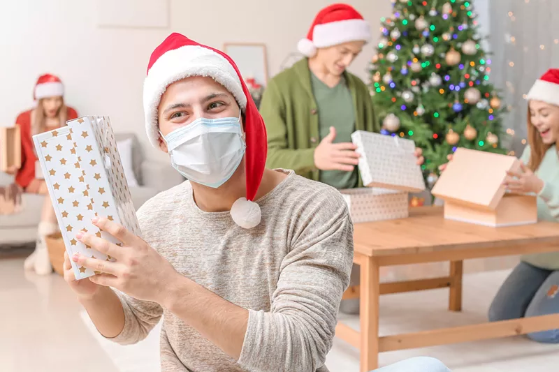Image: Wearing a mask won't automatically make gathering indoors for a prolonged period safe, but it's better than nothing.