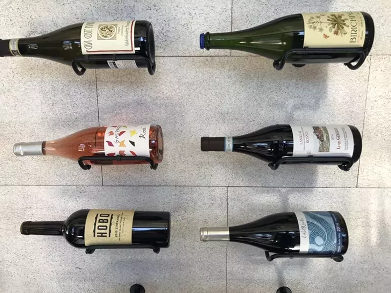 Image: Bottles on the sound-absorbent cork wall at Sauvage.