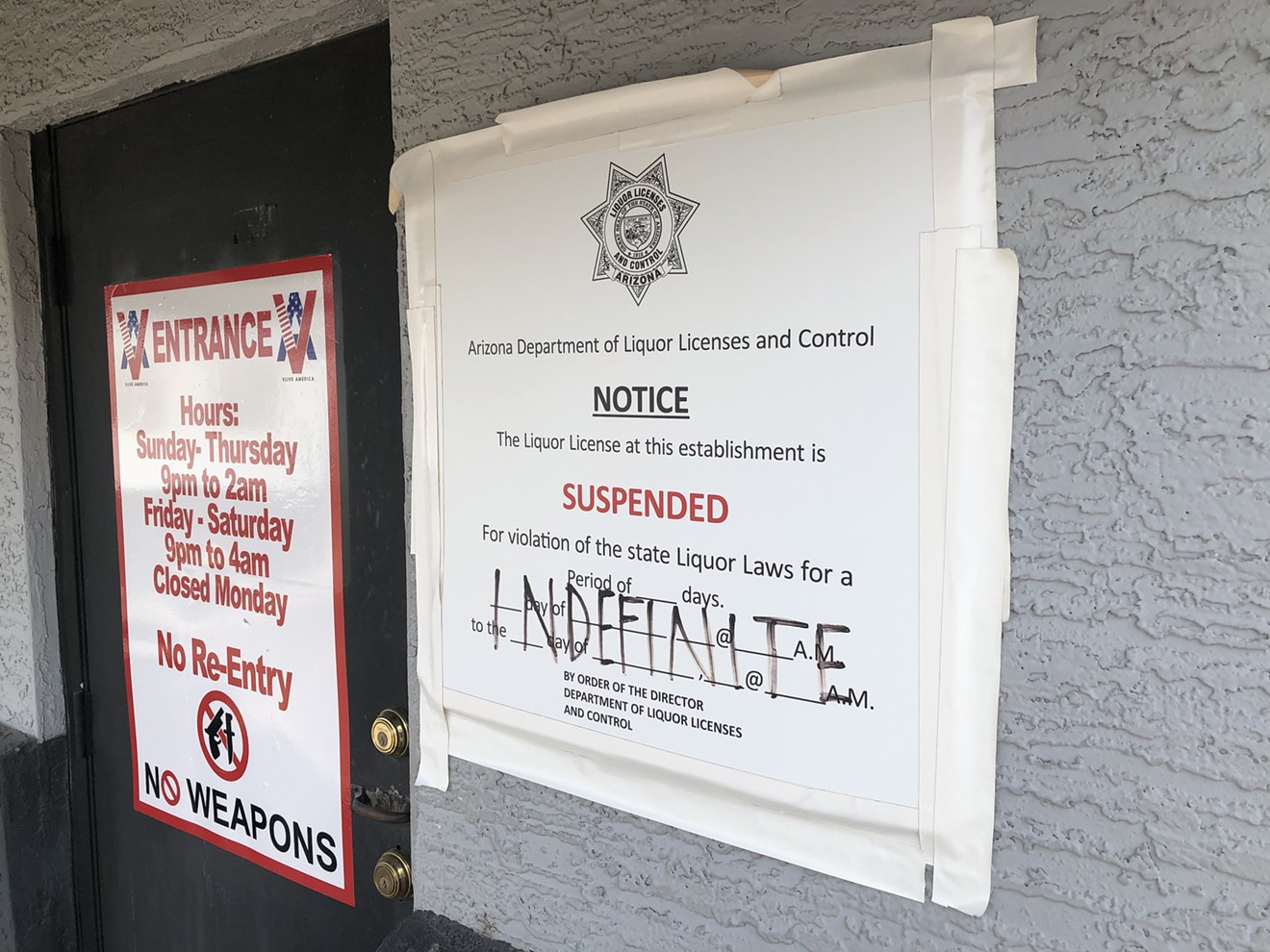 A notice from the Arizona Department of Liquor Licenses and Control outside VLive's front door in November.