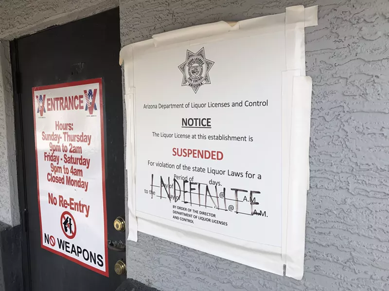 Image: A notice from the Arizona Department of Liquor Licenses and Control outside VLive's front door in November.