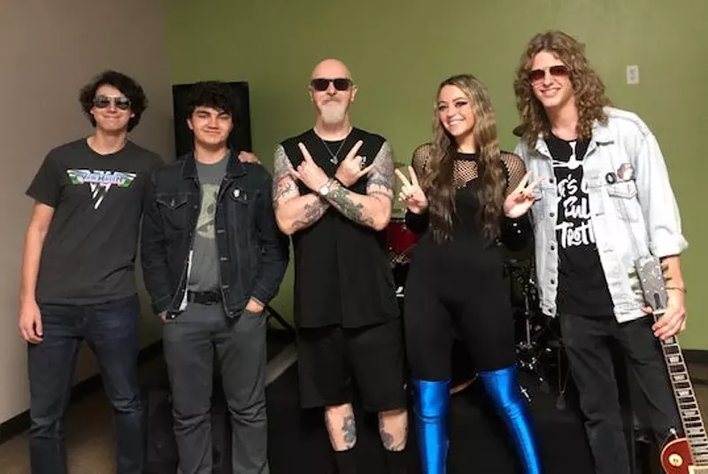 Image: Rob Halford of Judas Priest (center) is just one of the big names who teaches classes about the music industry at Solid Rock Teen Center.