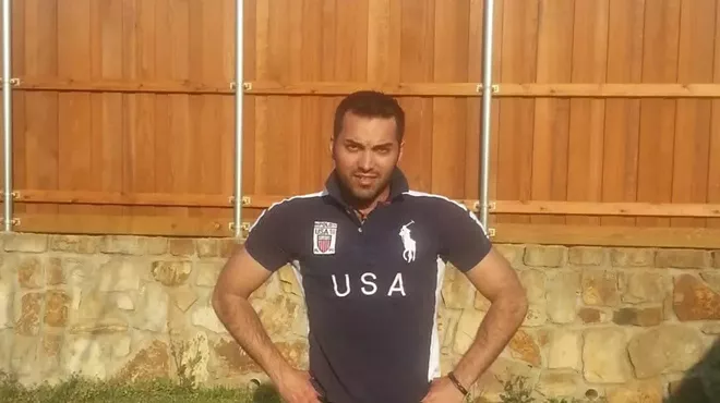a man in a USA rugby shirt