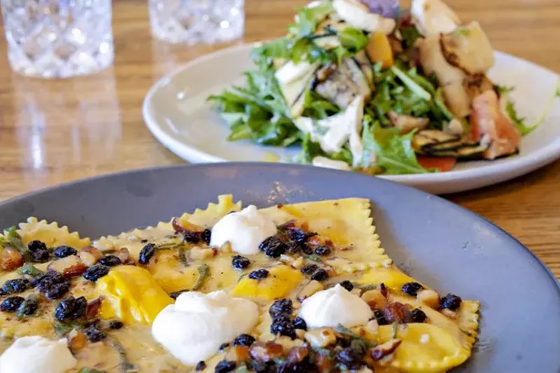 Image: The butternut squash-filled agnolotti, with truffled panzanella in background, is one of the intriguing pastas at Parma.