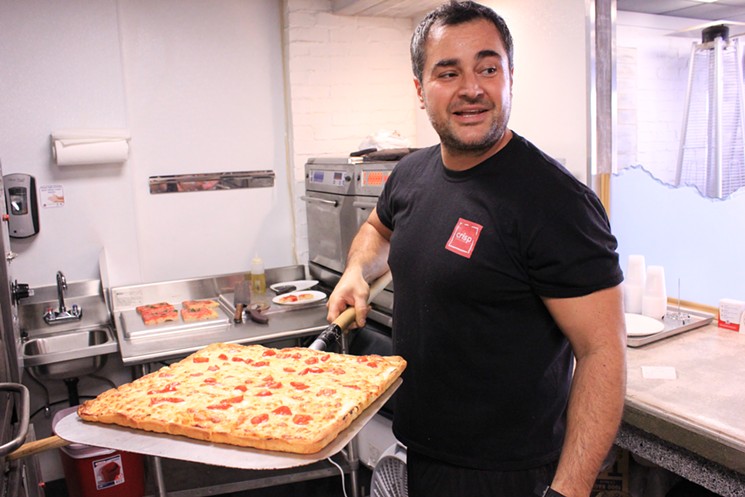 Adrian Langu, Old Town's newest pizza maker. - CHRIS MALLOY