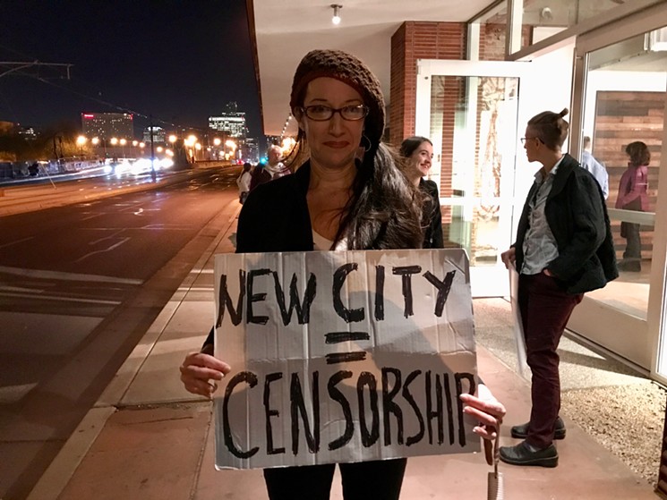 Poet Laureate Rosemarie Dombrowski protests during the opening for "In Sight II" at New City Studio. - LYNN TRIMBLE