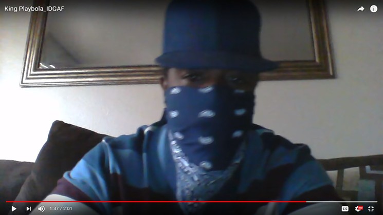 Cleophus Emmanuel Cooksey Jr., appearing on his hip-hop video "IDGAF" as King Playbola. The video was posted in November 2015, but the clothing resembles some that police link to a series of shootings between Thanksgiving and Christmas 2017. - SCREEN CAPTURE FROM YOUTUBE