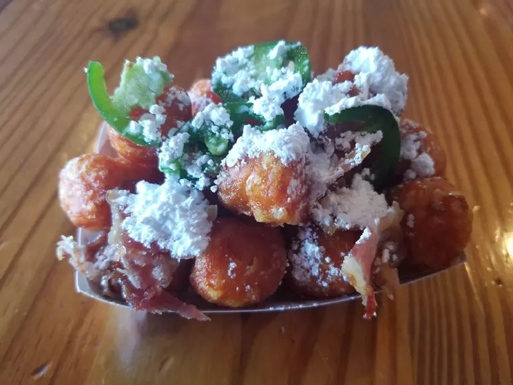 The Canadian Tots at Paradise Valley Burger Co. is a blend of sugar and spice with a northern touch. - PARADISE VALLEY BURGER CO.