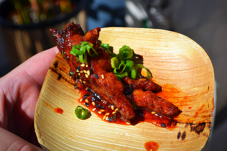 Clever Koi served saucy, braised chicken feet at this year's Devour Culinary Classic. - PATRICIA ESCARCEGA