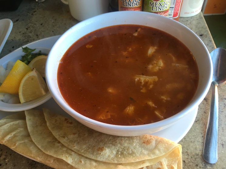 A steaming bowl of menudo before getting topped. - CHRIS MALLOY