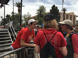 #RedForEd organizer Noah Karvelis chats with strikers. - JOE FLAHERTY