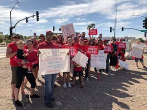 Teachers in Bullhead City held a "standout" on Main Street yesterday before returning to their classrooms. - KRISSINA MARIE