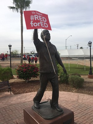 The statue of Cesar Chavez in San Luis, Arizona, got a new addition during the march. - ANTONIA FARZAN