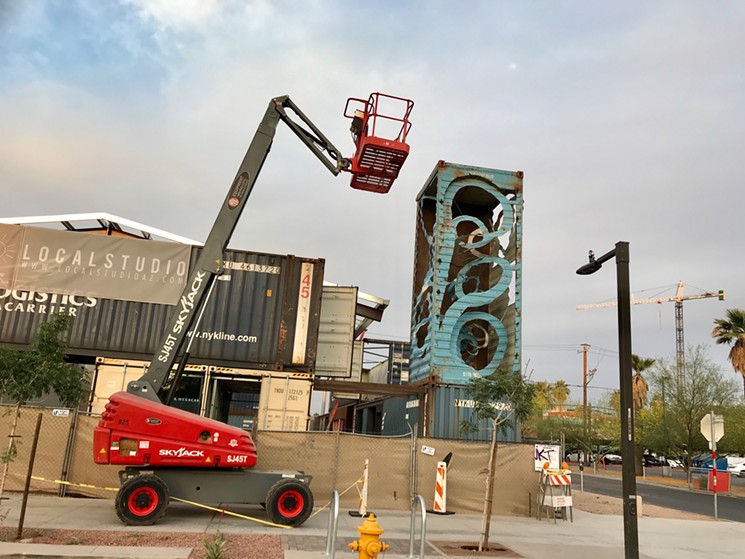 Here's what it takes to create a towering shipping container sculpture. - PETE DEISE