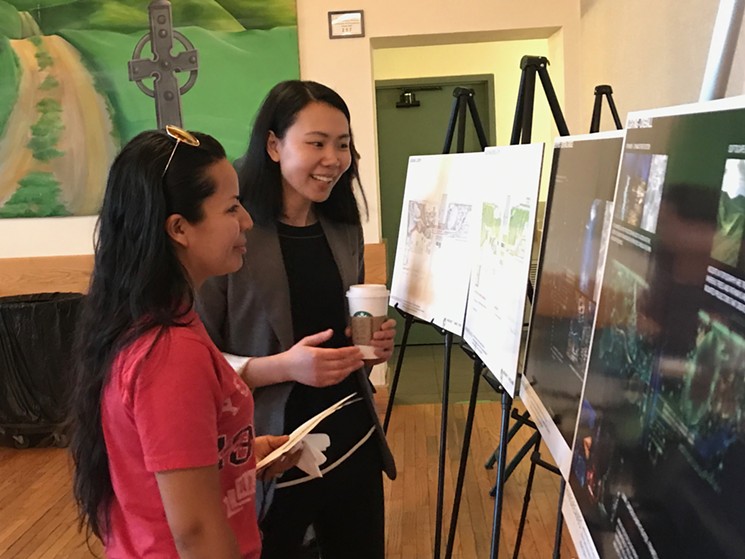 Jing Fan of Hargreaves Associates (right) talks with a community member during a recent open house. - LYNN TRIMBLE
