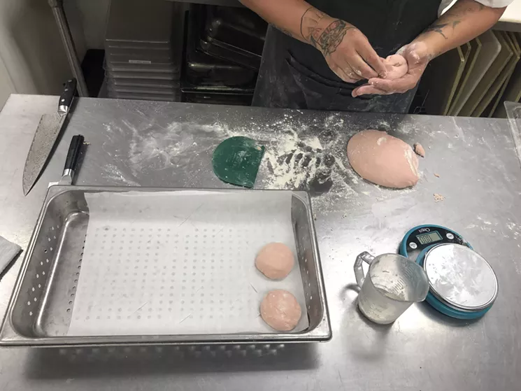 Duarte's bao bun dough is pink from wagyu fat. - CHRIS MALLOY