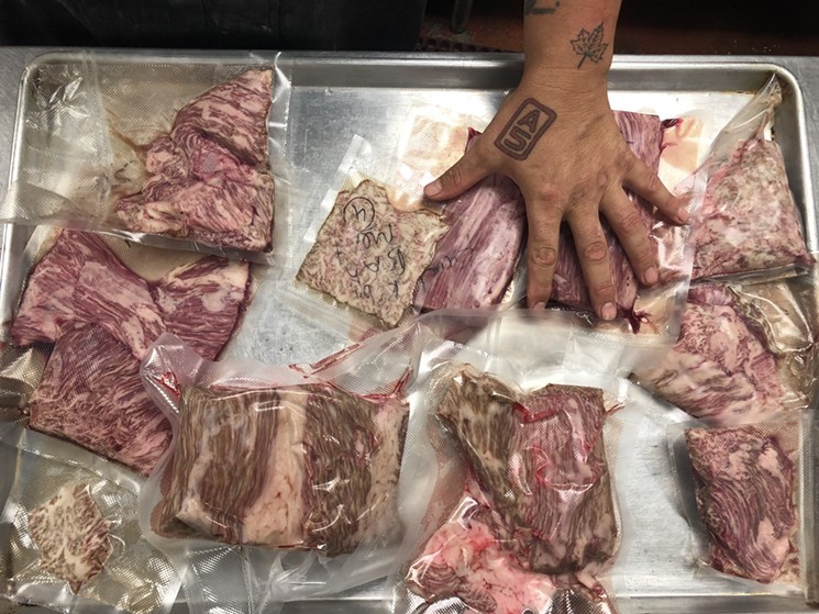 Assorted vacuum-packed cuts of Japanese wagyu at Finestre - CHRIS MALLOY