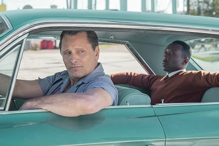 In Green Book,, Viggo Mortensen (left) plays Tony Vallelonga, also known as Tony Lip, an Italian-American nightclub bouncer who becomes the driver for accomplished African-American classical pianist Don Shirley (Mahershala Ali). - PATTI PERRET/COURTESY OF UNIVERSAL STUDIOS