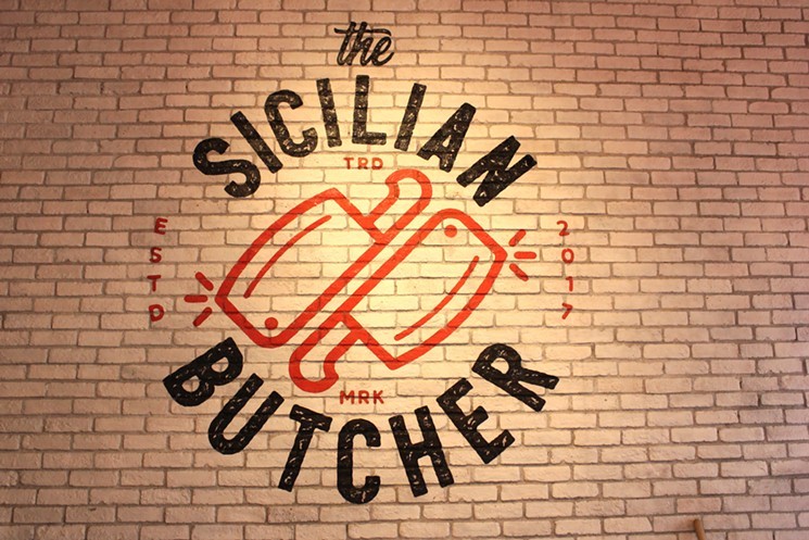 The paintings and murals on the walls of The Sicilian Butcher are handmade. - CHRIS MALLOY