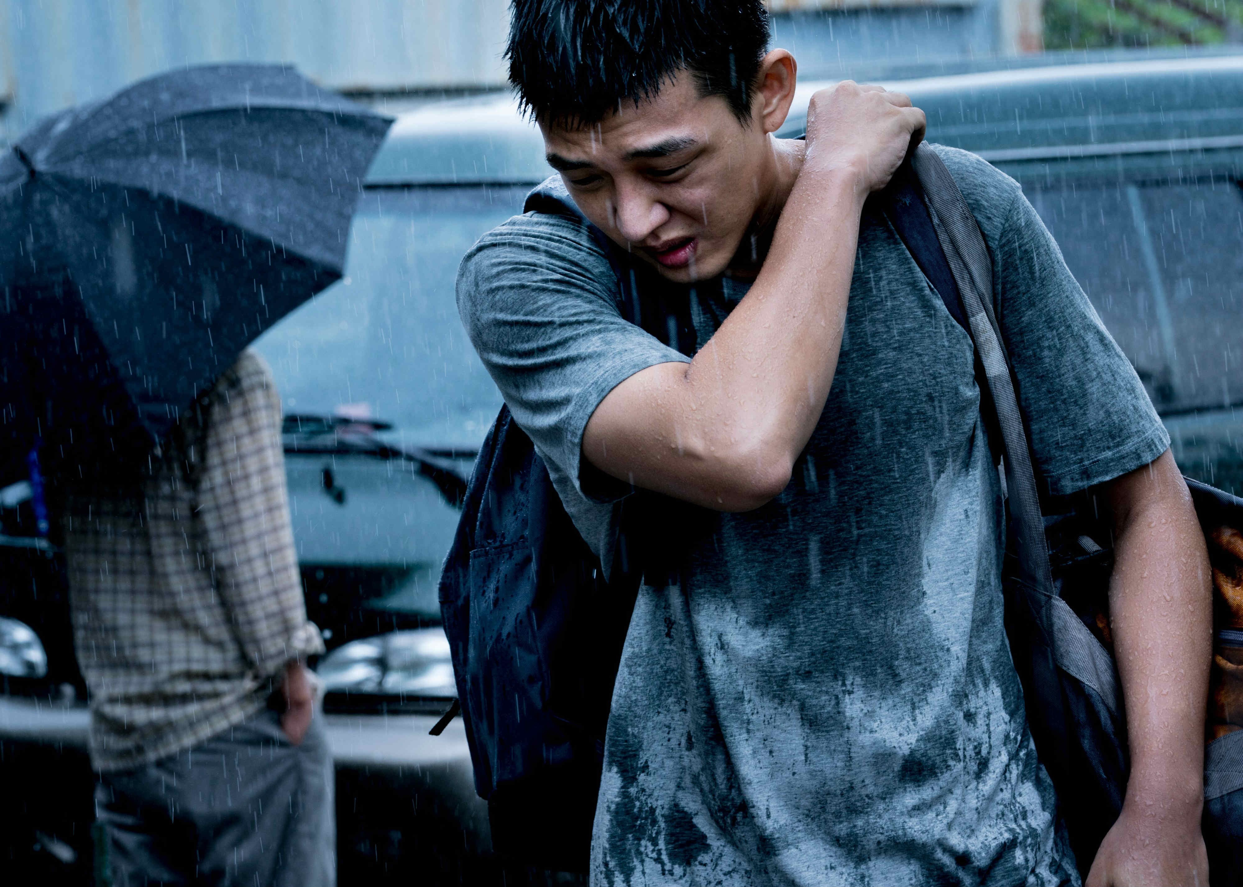 Yoo Ah-in plays Jongsu, a sturdy, shy day laborer who falls for the lovely, lively Haemi after seeing her for the first time in years, in Korean director Lee Chang-dong’s Burning — a look at obsession, class and romantic torment. - COURTESY OF WELL GO USA