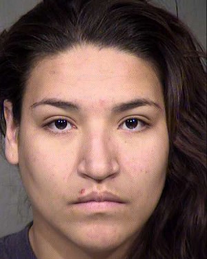 Griselda Vasquez was picked up by police with her brother Jesus Real in 2013. - COURTESY OF PHOENIX PD