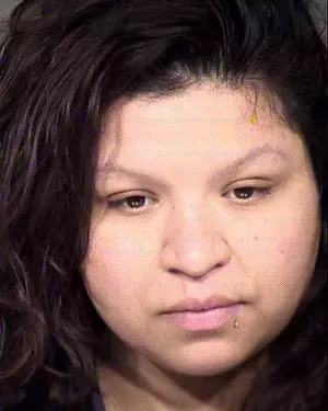 Liliana Vasquez twice has been accused of covering for a boyfriend in a shooting incident. - COURTESY OF PHOENIX PD