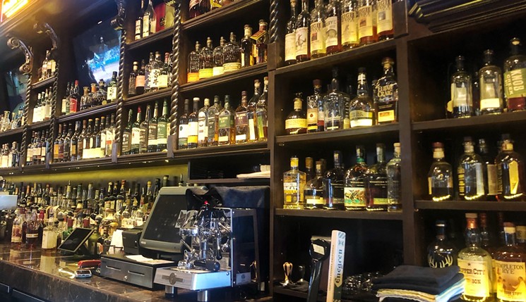 Fox Cigar Bar is far from short on whisky.  - BRI VALDIVIA