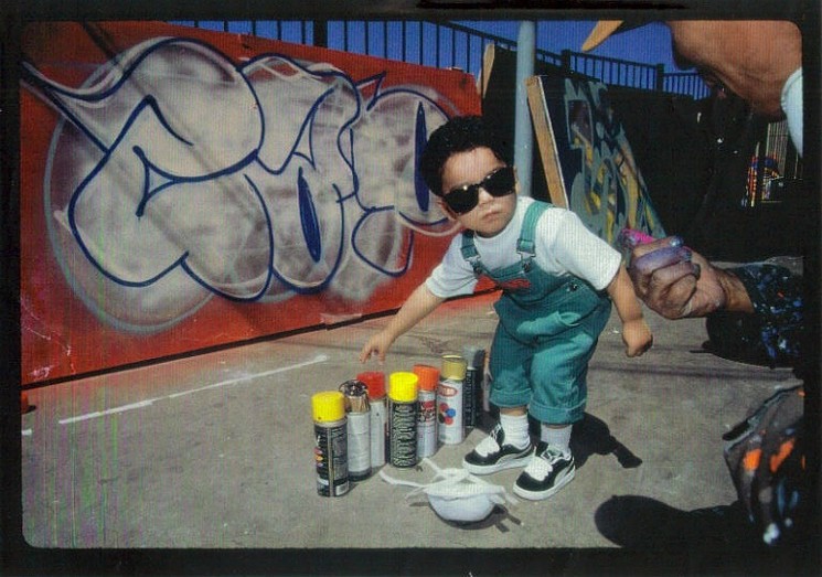 A young Champ Styles tagging along with his dad for some graffiti time. - MARTHA COOPER