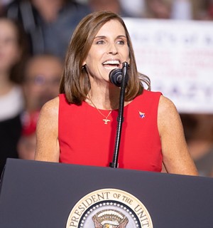 Then-candidate Martha McSally speaks at a Trump rally in 2018. - JIM LOUVAU