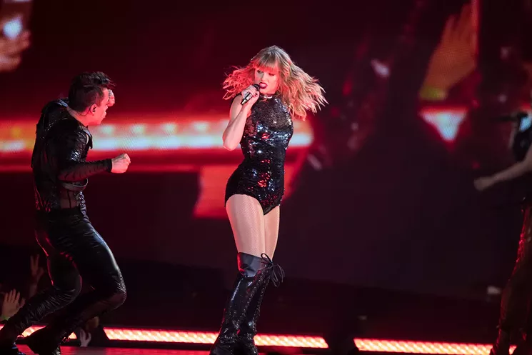 Taylor Swift was here for real a year ago. This week you can dress up like her if you wish. - JIM LOUVAU