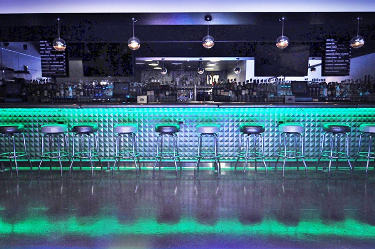 The bar at Stardust Pinbar, which contains more than 8,500 pinballs. - BENJAMIN LEATHERMAN
