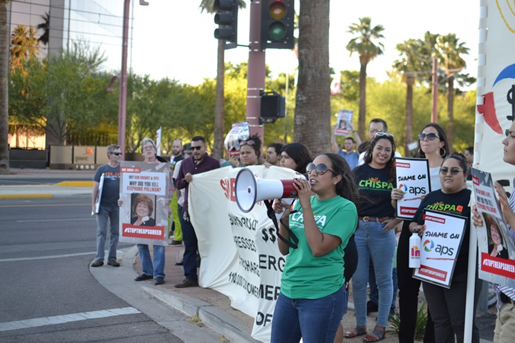 Protesters gather on June 20 outside the Phoenix Art Museum, where APS CEO Don Brandt was slated to receive an achievement award from the Arizona Chamber of Commerce. - ELIZABETH WHITMAN