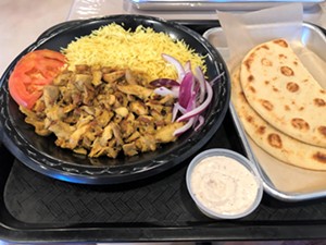 A chicken shawarma platter carved right from the spit. - CHRIS MALLOY